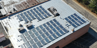 Trusted solar installer evaluating roof for solar panels in Illinois
